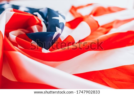 Closeup of ruffled American flag. Toned picture