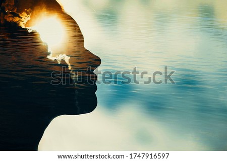 Woman silhouette with sun in head with copy space. Multiple exposure image. Royalty-Free Stock Photo #1747916597