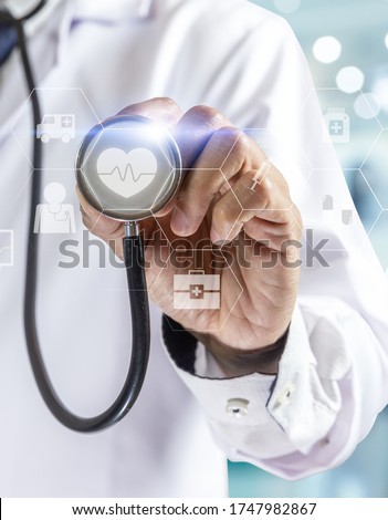 Medicine doctor or pharmacist with stethoscope standing and diagnosis in hospital with icon.Health care and medical or Health Insurance concept.Vertical image.

