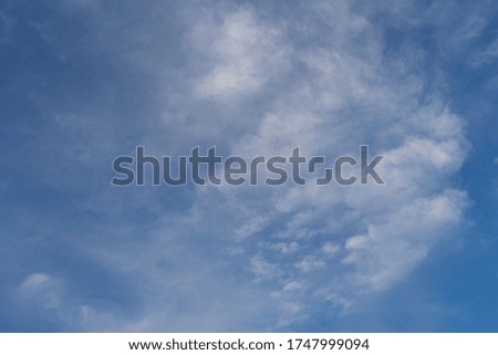 The vast blue sky and clouds sky background.