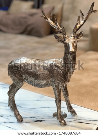 A picture of reindeer statue for home decoration