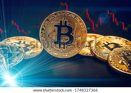Representation of many colored and illuminated bitcoin coins. Feeling of power and wealth. Cybercurrencies have been found. Investment, price fluctuation.