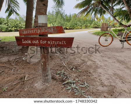 Attention: airstrip ahead - look out for aircraft