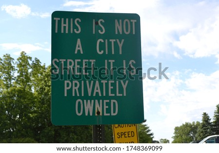 This is Not A City Street It Is Privately Owned Sign