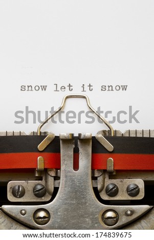 Let it snow note printed on mechanical typing machine