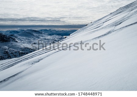 A beautiful picture of snow slope under the sunlight