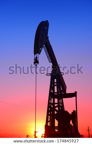 An isolated operation of pumping unit under the setting sun  
