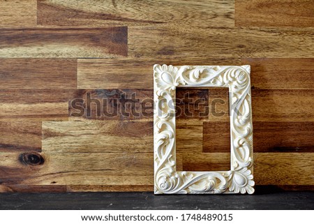 A studio photo of a picture frame