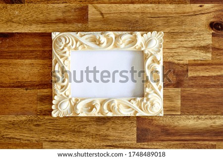 A studio photo of a picture frame