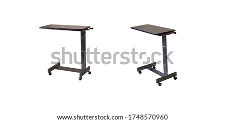 Bed table for patients on a white background,with clipping path Royalty-Free Stock Photo #1748570960
