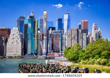 New York, USA - Sunny view of lower Manhattan Skyline from Brooklyn Park, United States of America.