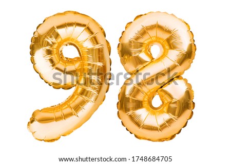 Number 98 ninety eight made of golden inflatable balloons isolated on white. Helium balloons, gold foil numbers. Party decoration, anniversary sign for holidays, celebration, birthday, carnival