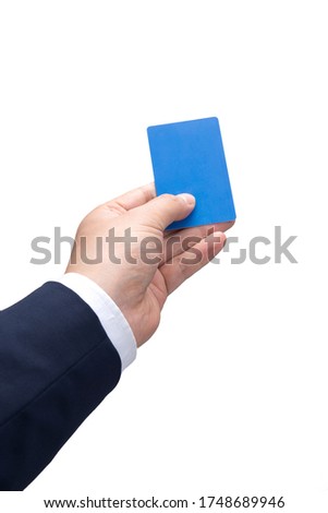 Image of hand of person paying by credit card