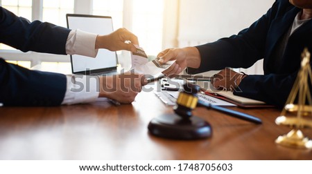 Businessmen tear up contract documents after negotiation fails. The concept of contract termination. Royalty-Free Stock Photo #1748705603