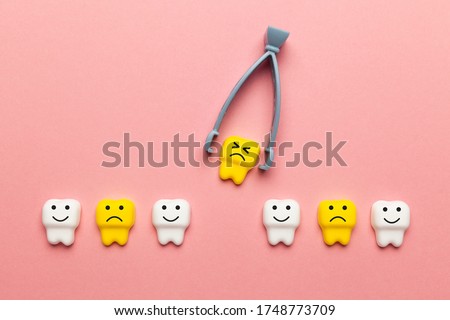 Baby tooth extraction. Surgery of children's teeth, concept.