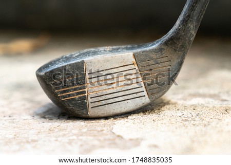 close-up photo of old golf club wood head
