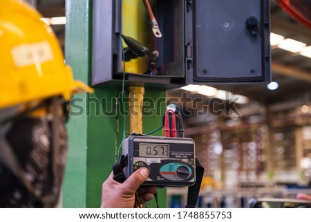 Electrical engineer is checking Lightning protection Measurement Tool Test system Electrical protection safety in a factory Rain equipment Royalty-Free Stock Photo #1748855753