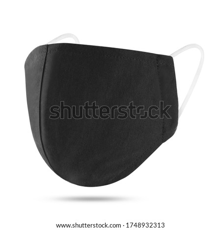 Blank black cotton reusable cloth mask isolated on white background. Front view. Empty surgical mask for mockup. Clear protective face mask for template & branding. Studio Photography Royalty-Free Stock Photo #1748932313