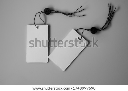White blank price label tag on white background.