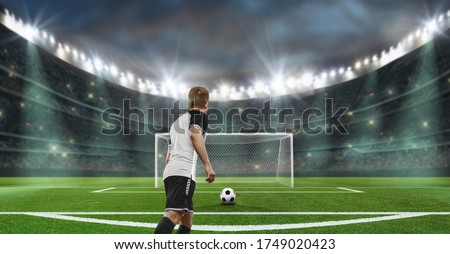 soccer stadium - a player ready for penalty Royalty-Free Stock Photo #1749020423
