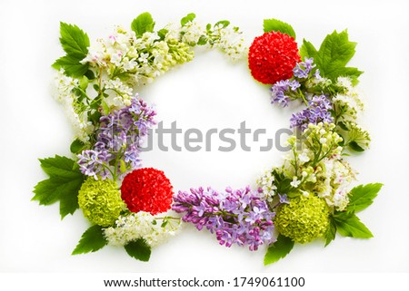 Red inflorescences. Bright colorful and fragrant flowers. Branches of blooming inflorescences around the perimeter of the postcard. Congratulatory illustration. Sign. Place for text. Selective focus.