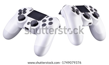 Set of white video game joysticks gamepad isolated on a white background, concept of playing games or watching TV.