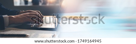 Businessman working on laptop. Panoramic business banner with copy space. Royalty-Free Stock Photo #1749164945