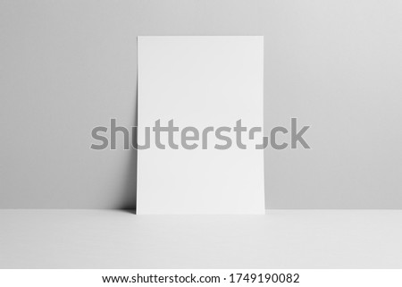 Flyer isolated on white background. 
Front view on table. Royalty-Free Stock Photo #1749190082