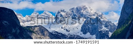 strongly karstic Austrian mountain Dachstein. Wide Panorama. Royalty-Free Stock Photo #1749191591