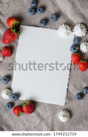 Wedding invitation and greeting card mockup,jpg,Card mockup with merengues and berries