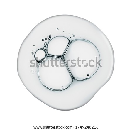 Cream gel transparent cosmetic sample texture with bubbles isolated on white background Royalty-Free Stock Photo #1749248216