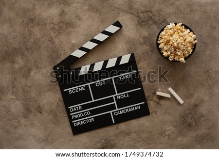 Filmmaking concept. Movie Clapperboard. Cinema begins with movie clappers. Top view. Copy space. Place for your text.