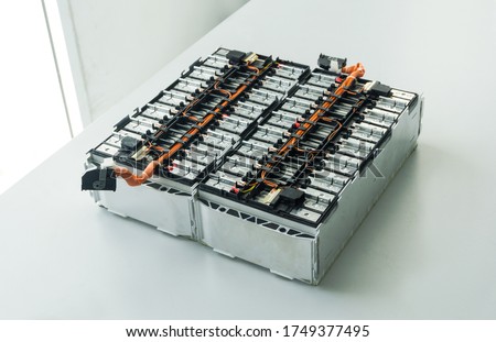 Selective focus of Electric car lithium battery pack and wiring connections internal between cells on background. Royalty-Free Stock Photo #1749377495