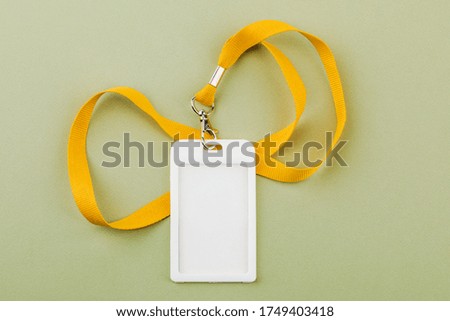Work ID name tag. The ID of the employee. Card icons with ropes on a green background.