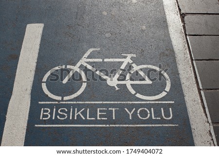 Marking of Bike on the sidewalk. Turkish translation: Bicycle path.