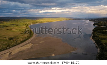 Aerial photo above a lake in a cloudy day