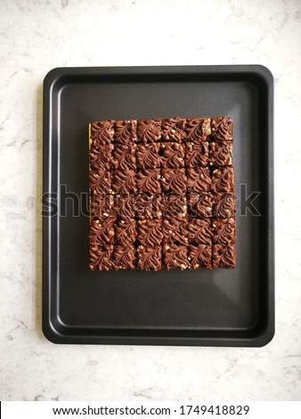 Flat lay of chocolate walnut brownies