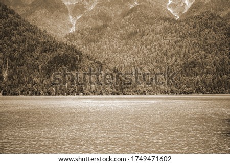 Vintage sepia mountain lake photo