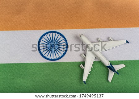 Flag of India and airplane. Resumption of flights after quarantine. Flights to India.