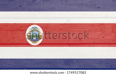 Costa Rica flag painted on wood background. Wooden texture flag of Costa Rica