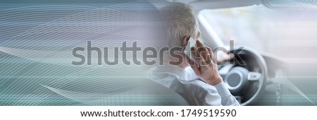 Man phoning while driving; panoramic banner