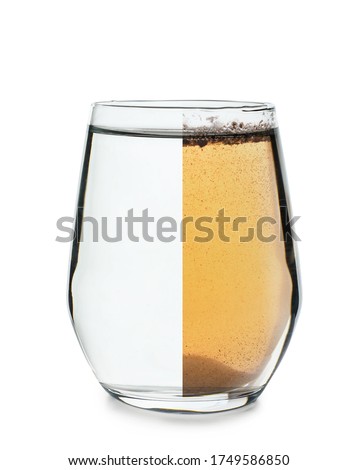 Clean and dirty water in glass on white background Royalty-Free Stock Photo #1749586850