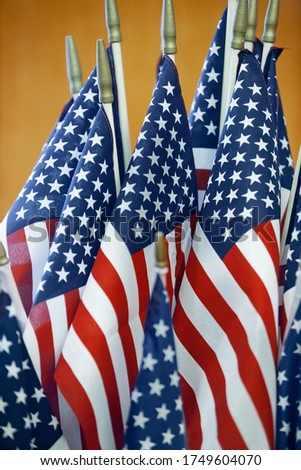 Close up of many US flags. July 4th, Independence day celebration. Patriotic holiday. 