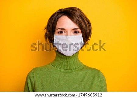 Close-up portrait of her she nice pretty girl wearing gauze safety mask stop contagious ncov cov mers pneumonia syndrome cdc isolated bright vivid shine vibrant yellow color background Royalty-Free Stock Photo #1749605912