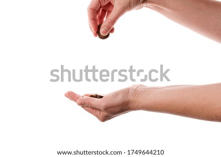 Coins in hand on white background. Last money. Concept photo. Financial crisis because of pandemic coronavirus. 