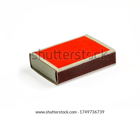 A match box with bright colorful matches on a white background.
 Royalty-Free Stock Photo #1749736739