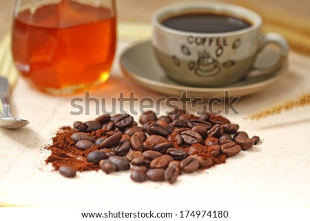 coffee beans and honey bee