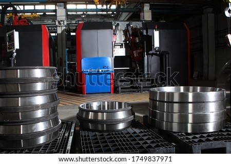 Bearing Processing Machine. Ready-made bearings of large diameter. Heavy industry concept. Photos in the premises of the plant. Copy of space.