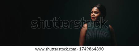Optimistic woman concept, Panoramic banner of portrait of black woman plus size smiling with confident, girl power, independent and strong, anti-racism concept. Positive Black power. Royalty-Free Stock Photo #1749864890