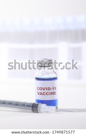 Covid-19 Virus Vaccine Shot in Vial Ready to Administer